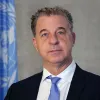 Dr. Serge Brammertz